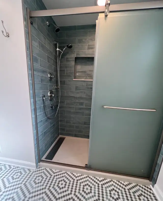 Modern bathroom shower with custom tile work